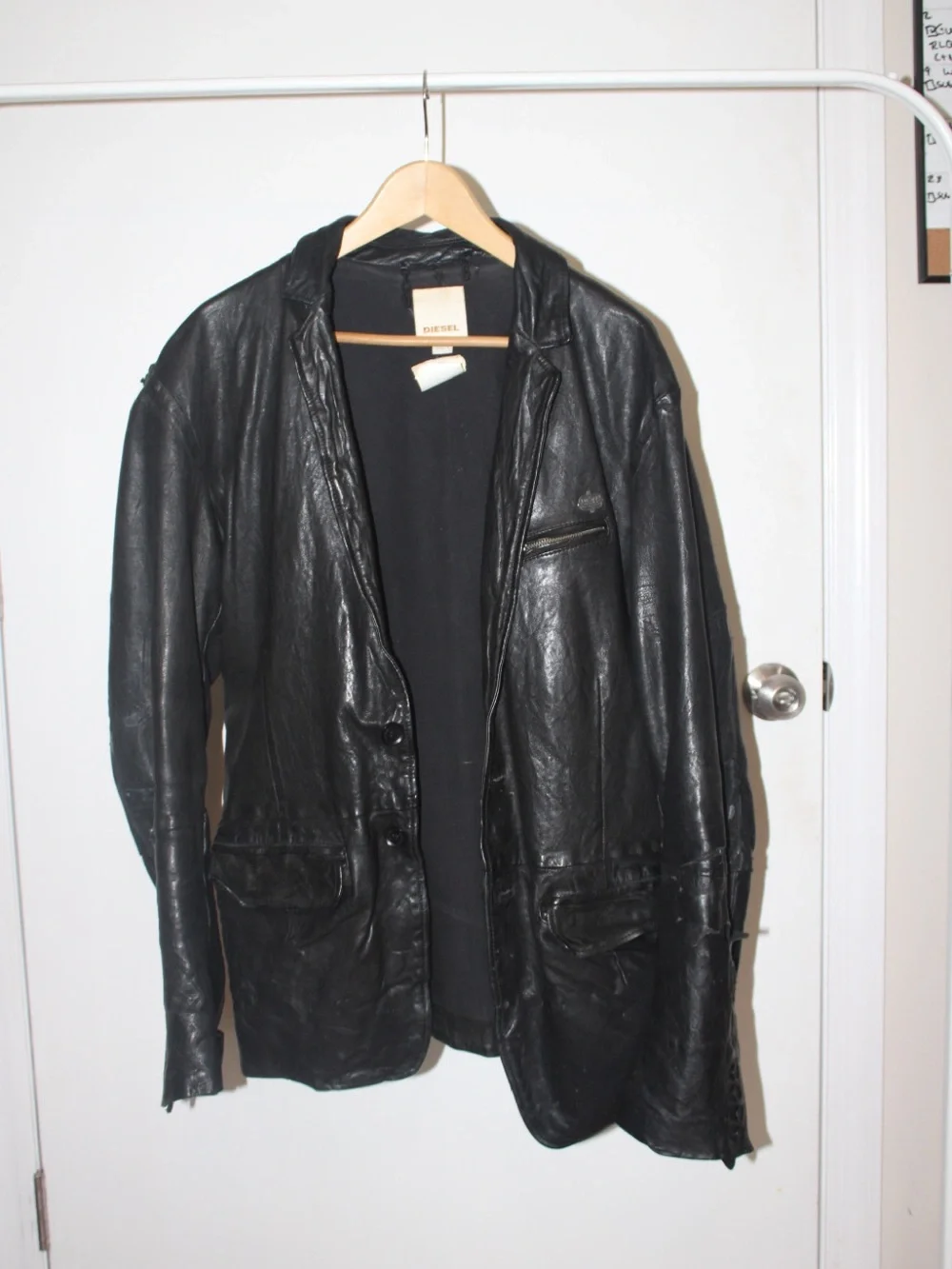 VINTAGE thrifted Diesel Men's Black Distressed Leather Jacket